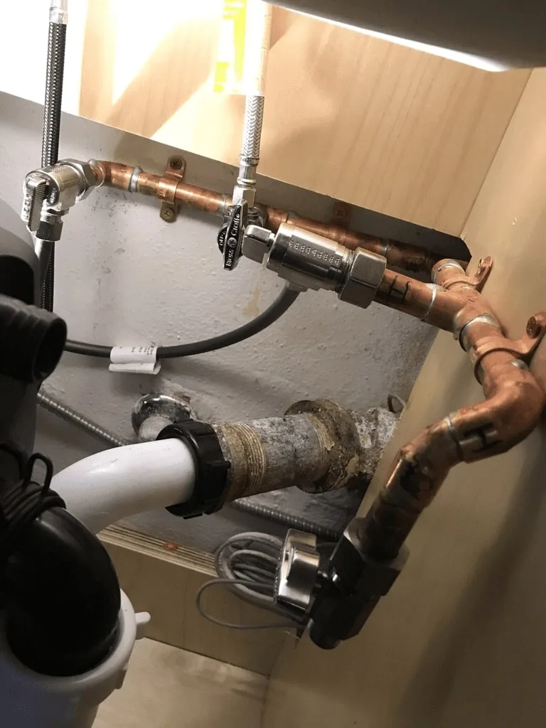 Plumbing Services in Seattle WA installing shutoffs and piping